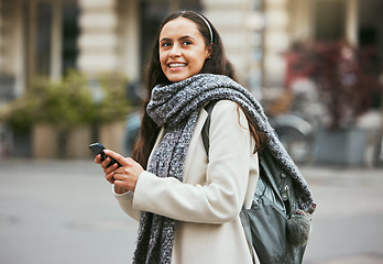 Image showing Walking, phone and woman travel on city sidewalk, street road or on holiday adventure journey In London UK. Mobile smartphone, England and girl search gps location with digital app, compass or map