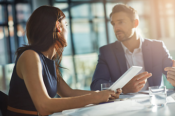 Image showing Partnership meeting, tablet and conversation planning stratergy, digital marketing research or web design management in office. Teamwork discussion, tech device and ux designer support conversation