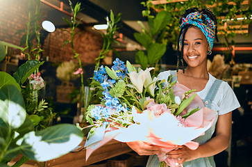 Image showing Black woman with bouquet, flowers and florist in greenhouse, small business owner and smile in portrait. Happiness, nature and entrepreneur with floral arrangement, Spring and vision with leadership