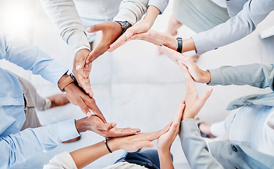 Image showing Support, team building and hands of business people in a circle for collaboration, trust and community. Partnership, mission and employees huddling as a group for a target, vision and solidarity