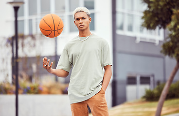 Image showing Fashion, fitness or portrait of black man with basketball in training practice, workout or exercise on city basketball court. Sports, game or male model with cool trendy clothes, Motivation or talent