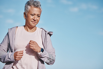 Image showing Senior woman, exercise run and blue sky outdoor fitness for retirement sports wellness, health workout and cardio training. Elderly athlete, energy motivation and cardio runner freedom and lifestyle