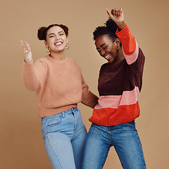 Image showing Happy, teenager and girl with dance and friends, young and trendy with gen z style, fun and freedom against studio background. Laughing, funny and dancing with stylish youth, energy and marketing