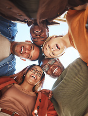 Image showing Group huddle, portrait smile and hug below for community, teamwork or trust together in the outdoors. Happy people smiling in diversity for solidarity or unity for team support or friendship