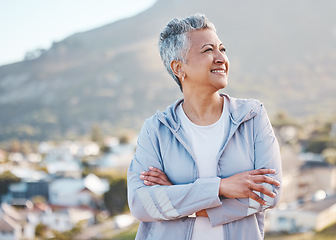 Image showing Elderly woman, thinking and outdoor fitness exercise for calm vision, relax freedom and sports workout in nature. Cardio lifestyle, senior person and athlete smile on mountain top with crossed arms