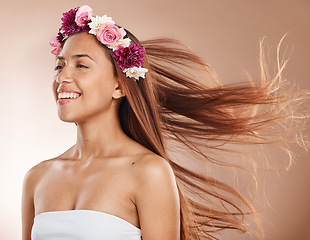 Image showing Hair care, beauty and flower crown on woman for cosmetics, floral and natural skin on studio background. Headshot of aesthetic model posing for salon, health and wellness mockup with skincare