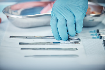 Image showing Surgery, tools and doctor hand with health, glove for safety and protection with medical equipment zoom. Surgeon, organize and cardiology healthcare, ready for cardiovascular surgical procedure.