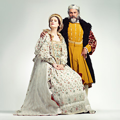 Image showing King, Queen and royal portrait of a couple in studio for renaissance, history and fantasy cosplay art. Medieval man and woman together for authority, crown and power as ruler, leader and royalty