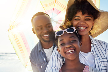 Image showing Happy family, smile and beach sunshine portrait together for travel holiday, summer vacation or bonding outdoor. African parents, child happiness and relax quality time on ocean sea for adventure