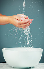 Image showing Woman hands, sink and water for washing, skincare hygiene and beauty isolated on studio background. Splash, liquid and cleaning body with bath, natural cosmetics for skin and health with wellness