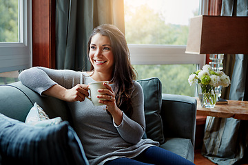 Image showing Happy woman, coffee or tea and home sofa while thinking of idea, future and memory to relax. Female with a smile on living room couch drinking from a cup for positive mindset, happiness and wellness