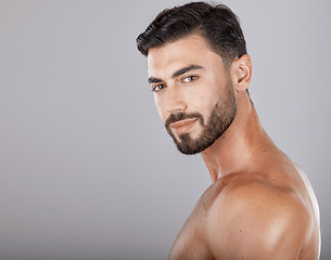 Image showing Man, studio portrait and skincare with beauty, cosmetics and wellness by studio backdrop with natural glow. Model, self care and healthy aesthetic for cosmetic self love, body care and radiant facial