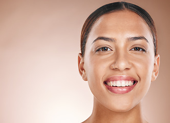 Image showing Beauty, portrait and skincare of natural woman marketing with healthy teeth and attractive smile. Wellness model with beautiful face on beige studio mockup background for cosmetic advertising.