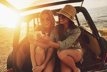 Image showing Women friends, selfie and car on road trip, beach and happy for social media app with smile on holiday. Woman, smartphone and happy friendship, ocean vacation or sunglasses for summer sunshine on web