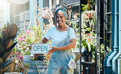 Image showing Flowers, open sign and store portrait of woman, startup small business owner or manager with retail sales choice. Commerce shopping service, florist market or African worker with plant garden product