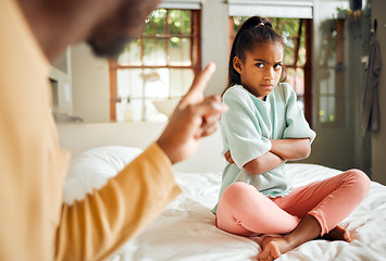 Image showing Scolding, angry and kid on bed in home with unhappy, annoyed and tantrum expression. Serious conflict, problem and upset father in black family disappointed with young child in house.