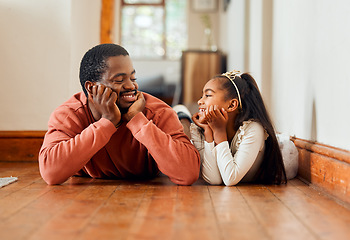 Image showing Relax, black family and father with daughter on floor, happy and bonding in their home. Love, parent and girl lying together, enjoying conversation, relationship and sweet moment indoors