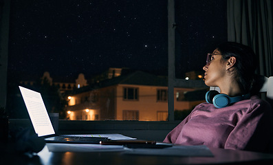 Image showing Woman thinking at night, student and laptop for test, distracted girl and notes for exams. Female, lady and academic with pc, dark or planning for task, essay or online reading for education or study