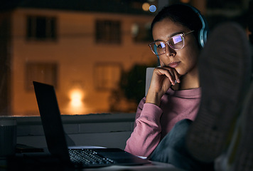 Image showing Creative woman, laptop and thinking at night for deadline, project or working late at office. Business woman relaxing by desk in thought for planning on computer in evening for startup at workplace