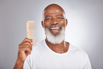 Image showing Senior black man with smile, comb and body hair, beauty and grooming with hygiene and cosmetic care against studio background. Hair care mockup, beard with portrait and face treatment and cosmetics