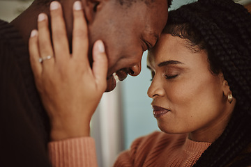 Image showing Black couple, home and love while happy together within a marriage with commitment, happiness and care. Face of man and woman with trust and support while in kitchen to bond in a house or apartment