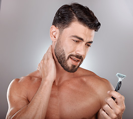 Image showing Razor, beauty or man in studio to shave beard in grooming marketing razor hair care products. Self care, studio background or healthy male model shaving for good skincare in morning routine treatment
