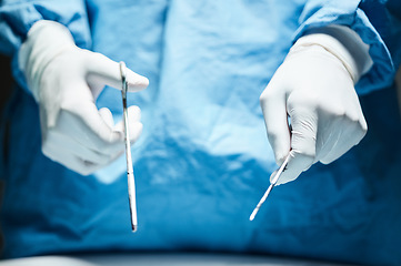 Image showing Doctor hands, gloves and surgery tools in closeup for healthcare, wellness or hospital job. Medic, health expert or professional with scissor, scalpel or ppe for safety, medical job or work in clinic