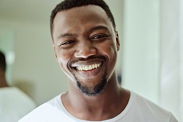 Image showing Portrait, smile and black man on bathroom, home and house for facial skincare in Nigeria. Face of happy guy, morning routine and hygiene for male beauty, self care and cleaning cosmetics in apartment