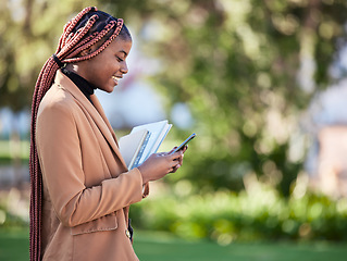 Image showing Phone, scholarship student and black woman at park on social media, researching or texting. Technology, education and happy female with books on 5g mobile smartphone for learning schedule outdoors