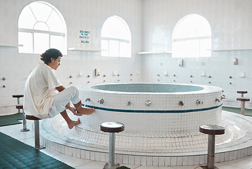 Image showing Islam, ablution and man washing before prayer in bathroom at mosque in Iran, spiritual cleaning ritual. Islamic culture, water and worship, muslim guy in cleansing care routine to prepare for praying