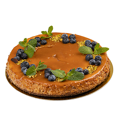 Image showing Delicious cheesecake with salted caramel sauce