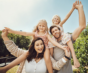Image showing Portrait, parents carry girls and in nature, quality time and bonding on weekend, happiness or playful. Love, mother and father with daughters on shoulder, outdoor or family on break, relax or loving