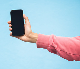 Image showing Man, hand or phone screen mockup on isolated blue background in social media, app or blank web design. Zoom, student or model person with technology mock up for city contact communication or branding