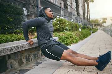 Image showing Exercise, triceps dips and black man in city, street or outdoors. Sports, thinking and young male athlete exercising, training and workout for muscle, strength and health, power or body care in town.