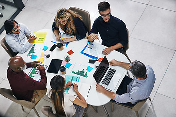 Image showing Meeting, planning and top view of a team in the office discussing company report or proposal. Teamwork, diversity and marketing employees working on a creative project together in the workplace.