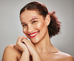 Image showing Makeup heart, beauty portrait and happy woman model in studio for cosmetics and dermatology. Headshot of aesthetic person with red color lipstick for love and valentines day facial skincare idea