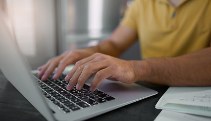 Image showing Hands, laptop and keyboard with man typing, working and copywriter writing article, internet research and closeup. Copywriting, creative and SEO, digital marketing worker with pc and wifi connection