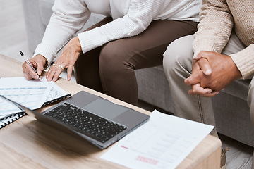 Image showing Laptop, budget and senior couple in living room for retirement research, investment planning or asset management. Elderly people hands, writing finance data for loan, mortgage and financial documents