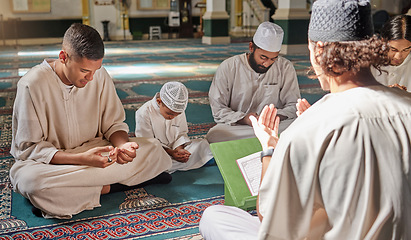 Image showing Muslim, child or men prayer to worship Allah in holy temple or mosque with gratitude as a family on Ramadan. Islamic, community or people in praying with boy or kid for Gods support, spiritual peace