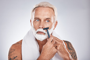 Image showing Man, face or shaving foam grooming in self love maintenance, beauty aesthetic or gray studio background. Zoom, mature or model and hair removal cream, facial razor cleaning or hygiene skincare growth