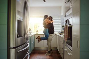 Image showing Black couple, happy home and love while together with care and happiness in a marriage with commitment and care. Young man and woman hug while in the kitchen to celebrate their house or apartment