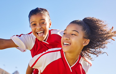 Image showing Sports soccer portrait, blue sky and happy kids excited for winning goal, competition success or fun challenge achievement. Winner, celebration and team friends, children or football player piggyback