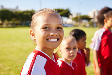Image showing Girl soccer player, portrait and field for training, teamwork and group diversity with smile. Young female kids, football group and happy for team building, learning and development with excited face