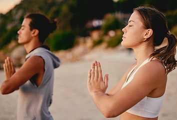 Image showing Meditation, prayer hands and yoga couple at beach outdoors for health and wellness. Zen chakra, pilates fitness and man and woman with namaste hand pose for praying, training and mindfulness exercise