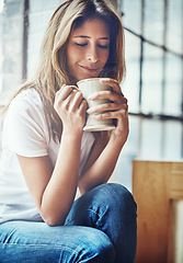 Image showing Calm, coffee and woman smelling the aroma while relaxing in her home on a weekend morning. Happy, relax and female from Columbia smell the caffeine scent while enjoying a hot drink in her house.