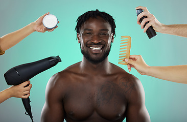 Image showing Hair, makeover and salon treatment with man in studio portrait with smile, hairdryer and comb on green background. Beauty, haircare and product for happy male model with natural hairstyle at barber.