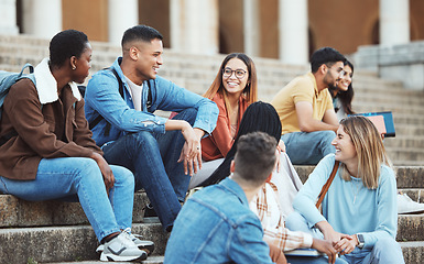 Image showing Laughing students, bonding or university stairs on college campus for group study, diversity class break or open day social. Smile, happy or talking friends, education learning goals on school steps