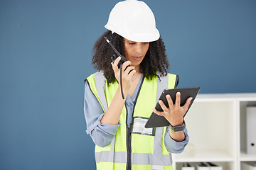 Image showing Radio, tablet and construction with a black woman builder talking over a walkie talkie in her office. Building, internet and safety with a female engineer using communication to manage a build site