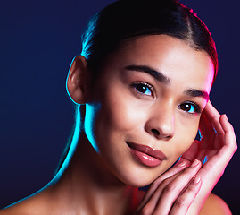 Image showing Beauty, neon shadow light and portrait of woman with dark lighting, facial cosmetics and skincare glow. Luxury studio makeup, aesthetic creativity and face model with creative pink blue color design