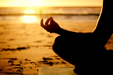 Image showing Lotus, yoga and hands silhouette at beach outdoors for health, wellness and fitness. Sunset, zen meditation and shadow outline of man meditating, chakra training or mindfulness exercise at seashore.